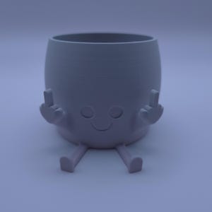 May include: A white ceramic planter shaped like a cartoon character with a smiling face, two arms raised in a middle finger gesture, and two legs.