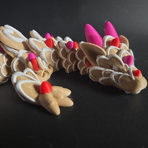 Galleta de corazón de dragón articulada impresa en 3D