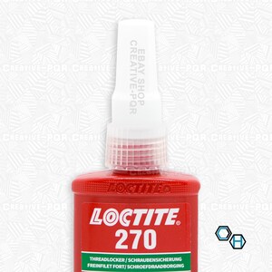 May include: A red bottle of Loctite 270 threadlocker with a white cap. The bottle has a green label with the text "Threadlocker/Schraubensicherung Freinfilet Fort/Schroefdraadborging" in black.