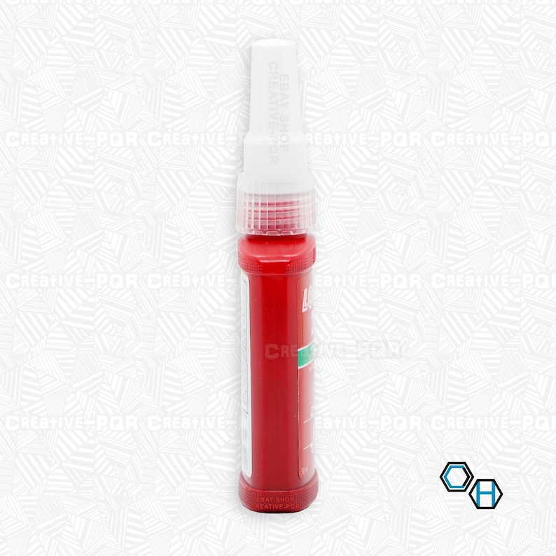 May include: A red and green adhesive bottle with a white cap. The bottle is labeled "Loctite" and "Threadlocker".