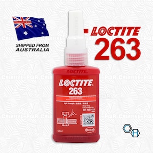 May include: A red bottle of Loctite 263 threadlocker with a white cap. The bottle is labeled with the product name, strength, and application instructions. The bottle is 50 ml.