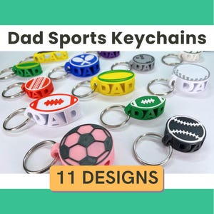 May include: A collection of colorful keychains with sports-themed designs, including a football, soccer ball, and baseball. Each keychain features the word "DAD" in a cutout design. The image also includes the text "Dad Sports Keychains" and "11 DESIGNS".