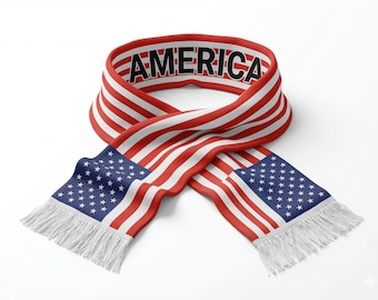 May include: A patriotic scarf featuring the American flag design. The scarf has red and white stripes with blue star fields at the ends. The word "AMERICA" is printed in black on the red border.