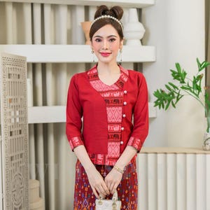 Women's native shirt decorated with elephant pattern tape