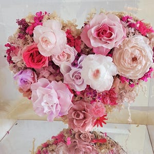 May include: A set of three ceramic mugs with a speckled, matte finish. The mugs are in shades of cream, light gray, and dark gray. Each mug has a simple, minimalist design, perfect for coffee or tea.