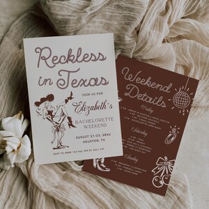 May include: Two invitation cards for a bachelorette weekend. The main card reads "Reckless in Texas" with a cartoon illustration. The second card lists weekend details. Both cards are on a beige fabric background.