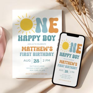 Op de afbeelding: Een verjaardagsuitnodiging en een smartphone tonen hetzelfde ontwerp. Het ontwerp bevat een gele zon, de woorden "ONE HAPPY BOY" en details voor Matthew's eerste verjaardag op 28 augustus om 14.00 uur. De uitnodiging is wit met een retro lettertype.