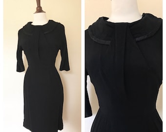 Vintage black wiggle dress 1950s size S silk neck rayon