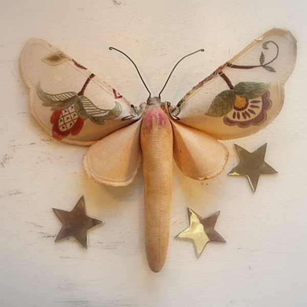 Moth soft sculpture made from vintage tablecloth.