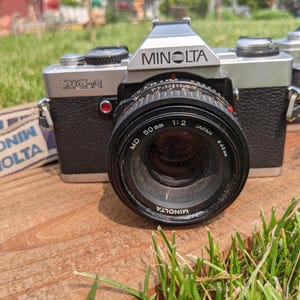 Minolta XG-A 35mm SLR Film Camera + Minolta MD 50mm japan