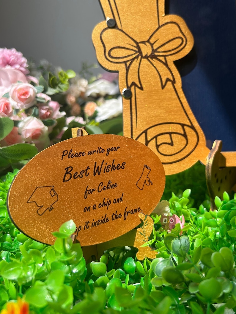 Wooden guest book alternative shaped as monogram C for a graduation party celebration