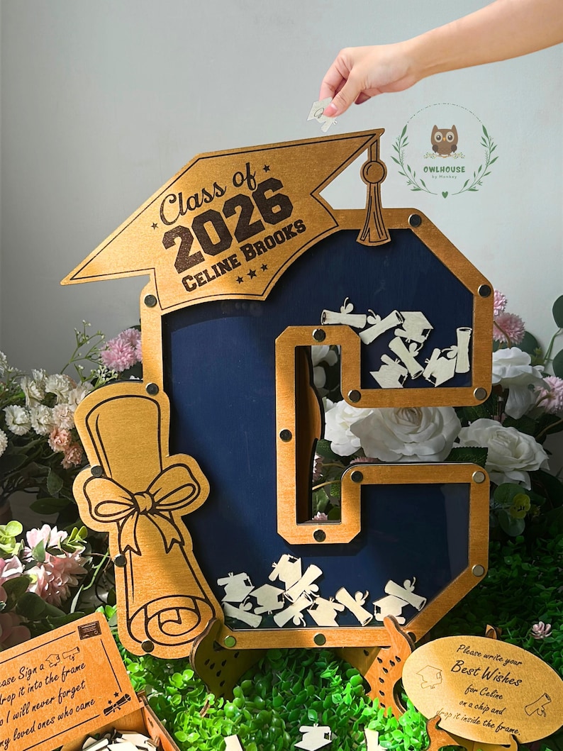 Initial letter graduation guestbook used as grad party sign in decor centerpiece
