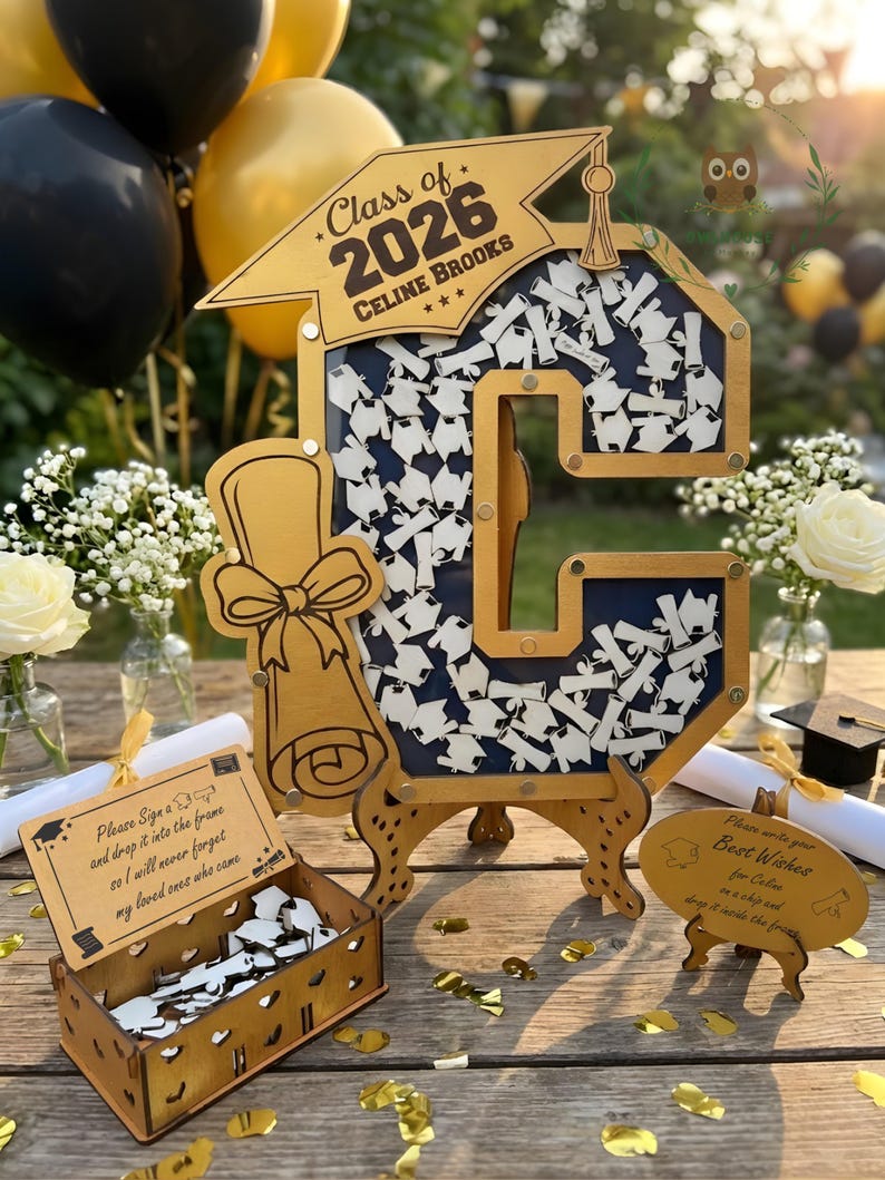 Graduation guestbook letter C for Class of 2026 styled as elegant grad table decor