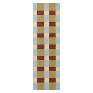 May include: A rectangular rug with a checkered pattern. The rug features alternating squares of light blue, tan, olive green, and burgundy. The rug is made of a woven material and is designed for indoor use.
