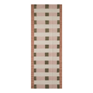 May include: A rectangular rug with a woven design. The rug features alternating horizontal stripes of white, pink, and olive green. A border of a darker pink color frames the rug. The rug is suitable for a hallway or entryway.