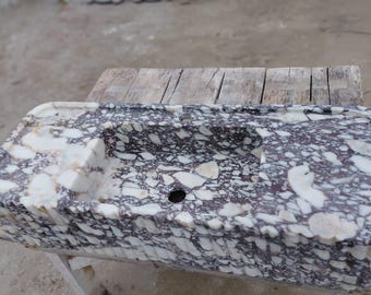 Calacatta violet marble sink. Wall-mounted handmade sink.