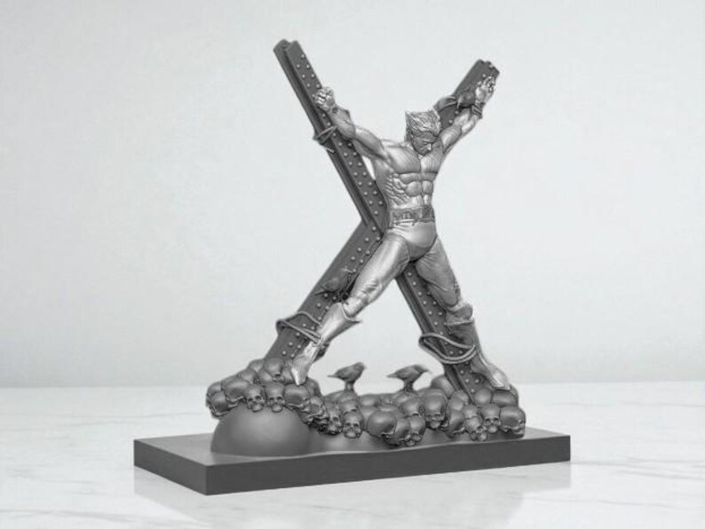 May include: A silver-colored sculpture of a superhero figure bound to a large X-shaped structure. The base features skulls and small bird figures. The sculpture is detailed and stands on a rectangular base.