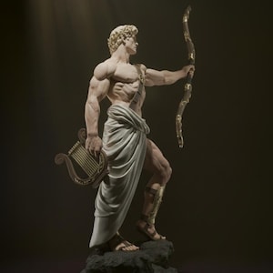 May include: A detailed sculpture of a muscular figure holding a bow and lyre. The figure is draped in white cloth and stands on a rocky base. Gold accents adorn the bow, lyre, and leg armor. The statue is set against a dark background.