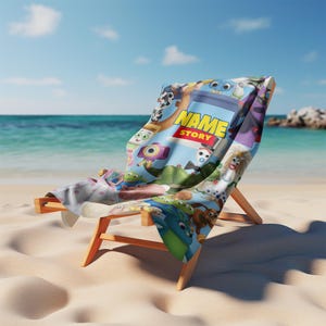 May include: A beach towel draped over a wooden lounge chair, featuring a colorful collage of animated characters and the text "NAME STORY" in bold yellow letters. The design includes various figures in blue, green, and red tones on a light background.