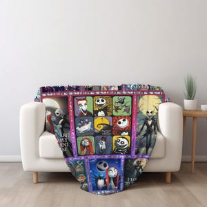 May include: A fleece throw blanket featuring a grid of colorful squares with characters and scenes from "The Nightmare Before Christmas." The blanket is draped over a white sofa. The text "ARE SIMPLY MEANT TO BE" is visible.