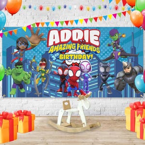 May include: A birthday banner featuring the name "Addie" and the phrase "Amazing Friends 3rd Birthday!" with superhero characters. Colorful balloons and gift boxes decorate the scene. A white rocking horse is in the foreground.