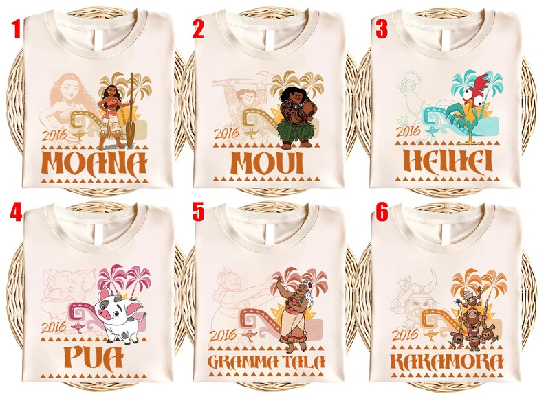 May include: Six off-white t-shirts featuring Moana characters: Moana, Maui, Heihei, Pua, Gramma Tala, and Kakamora. Each shirt displays the character name, the year 2016, palm trees, and a geometric pattern in a warm, muted color palette.