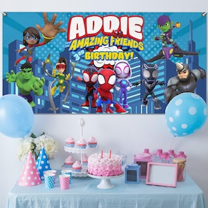 May include: A birthday party scene with a banner featuring superhero characters and the text "Addie and her Amazing Friends 3rd Birthday!" A pink and white cake, cupcakes, and balloons complete the festive decor.