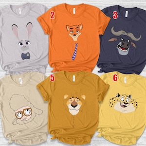 May include: Six short-sleeved crew neck t-shirts in light gray, orange, dark blue, beige, mustard yellow, and bright yellow. Each shirt features a different cartoon animal character graphic from Zootopia, numbered one through six in red.