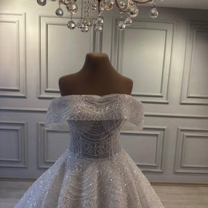 Luxury Off-Shoulder Ball Gown: Beaded Lace Wedding Dress
