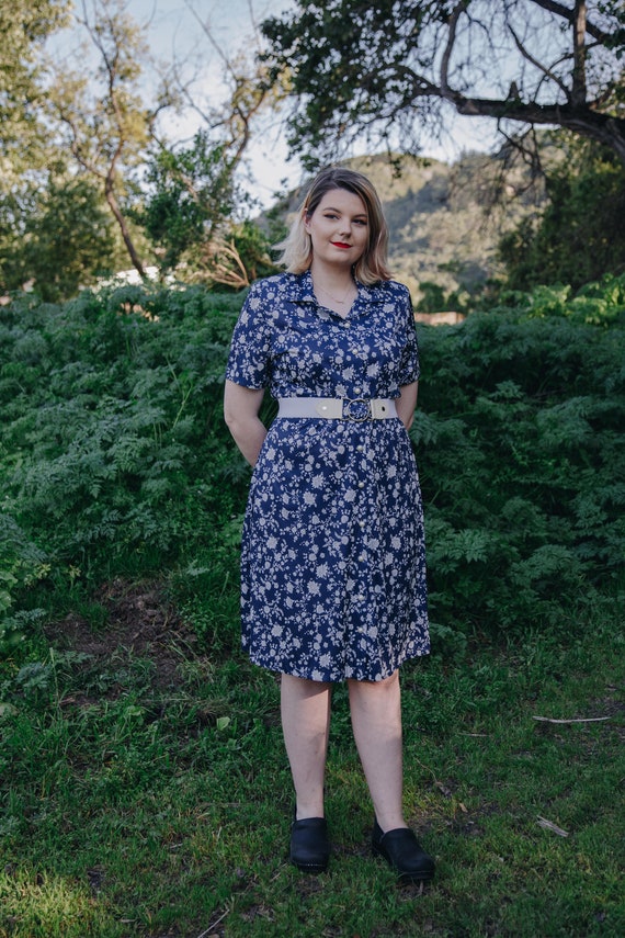 blue and white floral dress short sleeve Blue Short Sleeve Fitted Floral Mini Dress main image 1