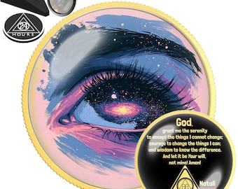 May include: A round gold-rimmed medallion featuring a stylized eye with a galaxy iris, accompanied by a black stand, a small oval pendant with a portrait, and a black circular token with the text 24 HOURS and a triangle symbol.