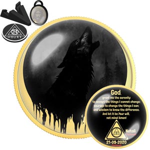 May include: A round gold-rimmed medallion featuring a black silhouette of a wolf howling at a moon. A smaller circular insert displays the Serenity Prayer text, a triangle symbol with the number 24, and the date 21-09-2020 with the name Natali.