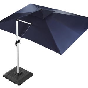 May include: A blue patio umbrella with a white metal frame and a black base. The umbrella is tilted to the side.