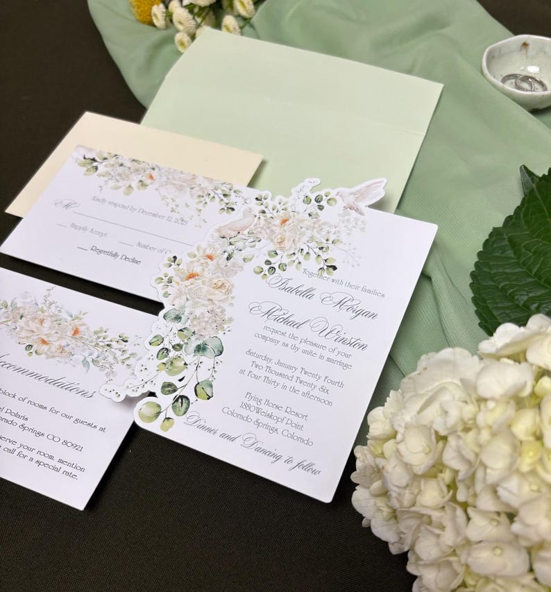 Die cut wedding invitation with florals and doves.  An invitation with coordinating RSVP and Details card.