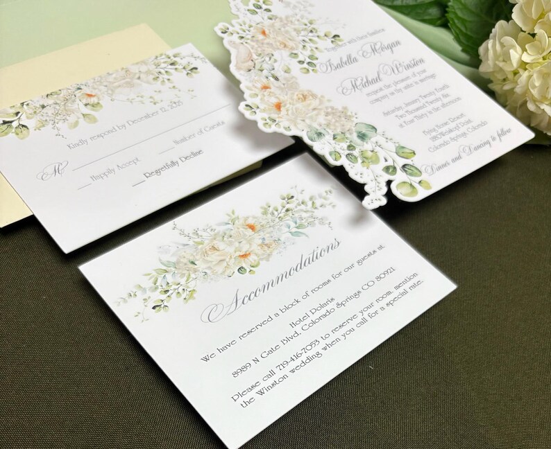 die cut wedding invitation featuring beautiful florals and doves. The invitation has a decorative border