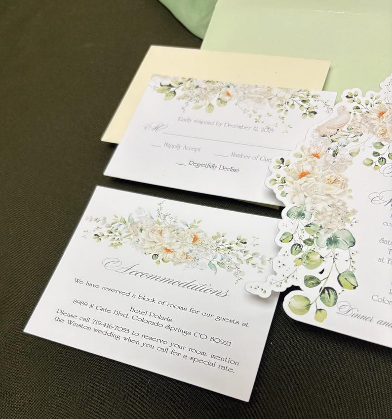 Accommodations cards with Alabaster flowers and coordinating RSVP card