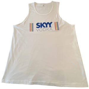 May include: White tank top with the text "SKYY VODKA" in blue, with vertical rainbow stripes on either side. The tank top has a scoop neck and a sleeveless design. The fabric appears to be a lightweight material.