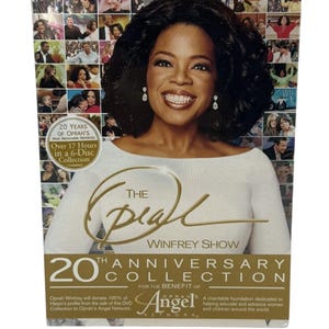 May include: The Oprah Winfrey Show 20th Anniversary Collection DVD set. The cover features Oprah Winfrey smiling, with the show's logo and text indicating over 17 hours of content on 6 discs. The collection benefits Oprah's Angel Network.
