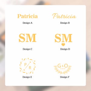 May include: A collection of six design options in gold lettering. The designs include the name "Patricia", initials "SM", and other monogram options. Each design is labeled with a corresponding letter from A to F.