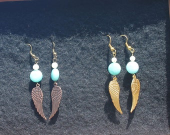 Angel wing earrings with Amazonite and Mother of Pearl beads. With bronze and gold tone wings