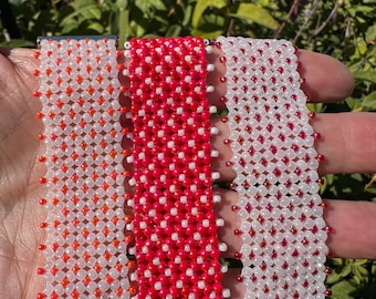 Beaded bracelets, pinky orange beads, chenille stitch