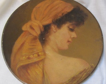 Vintage hand painted woman on metal plate