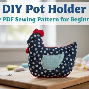 May include: A handmade pot holder in the shape of a hen, made from navy blue fabric with white daisy patterns. It has a red comb and beak, and a light blue wing with yellow dots. Text at the top reads "DIY Pot Holder".