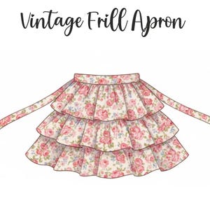 May include: A waist apron featuring three tiers of ruffles with a pink and red rose floral pattern on a cream background. The text "Vintage Frill Apron" is printed in black script above the apron, which includes two long fabric waist ties.