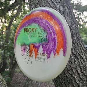 Dyed Axiom Proxy Disc Golf Disc: Forest Silhouette Design