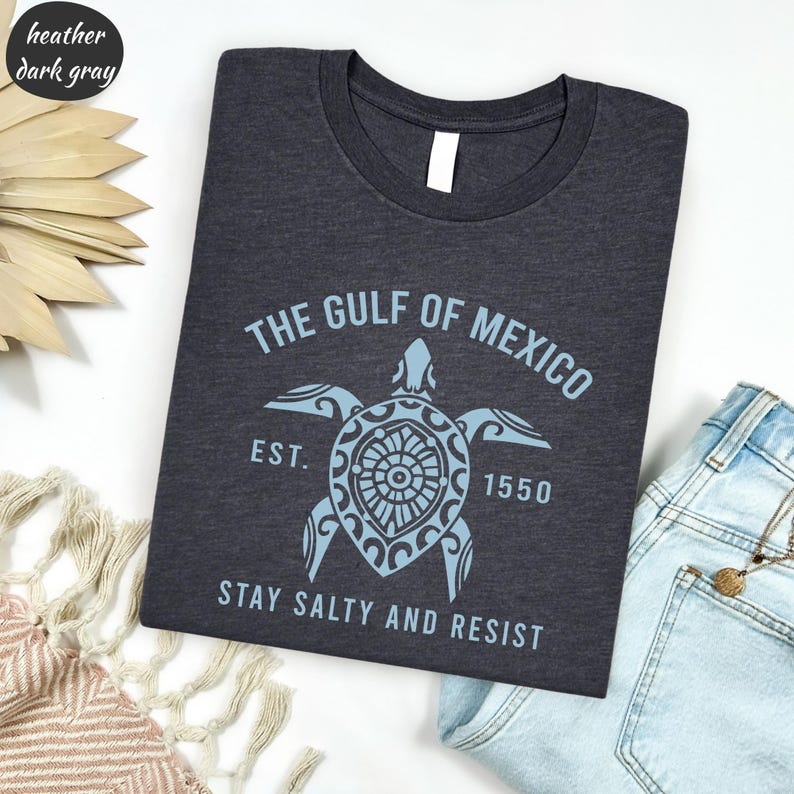 a t - shirt that says the gulf of mexico with a turtle on it