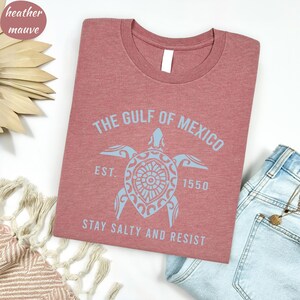 a t - shirt that says the gulf of mexico on it