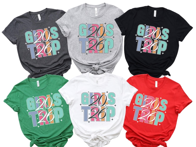 a collection of six t-shirts, each with a unique design and color, featuring the text "Girls Trip" prominently.