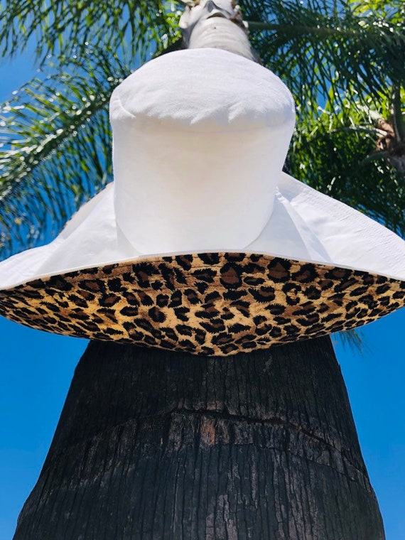 white wide brim sun hat