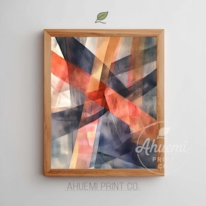 May include: Abstract art print in a wooden frame. The artwork features intersecting lines in shades of red, navy, gold, and gray. The print has a watercolor effect. The bottom of the frame has the text "AHUEMI PRINT CO."